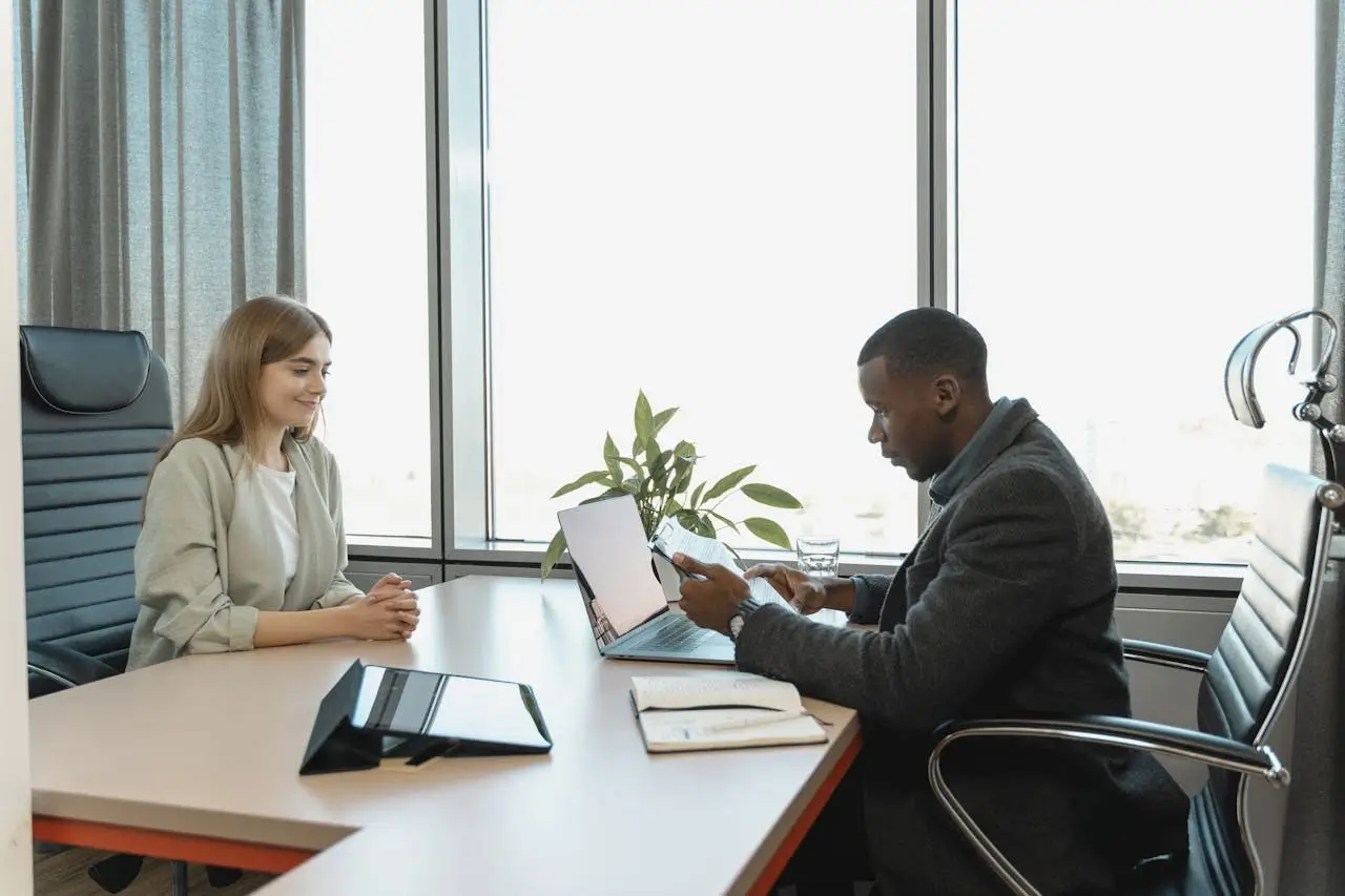 Professional HR compliance concept showing HR completing employment verification for I-9 compliance