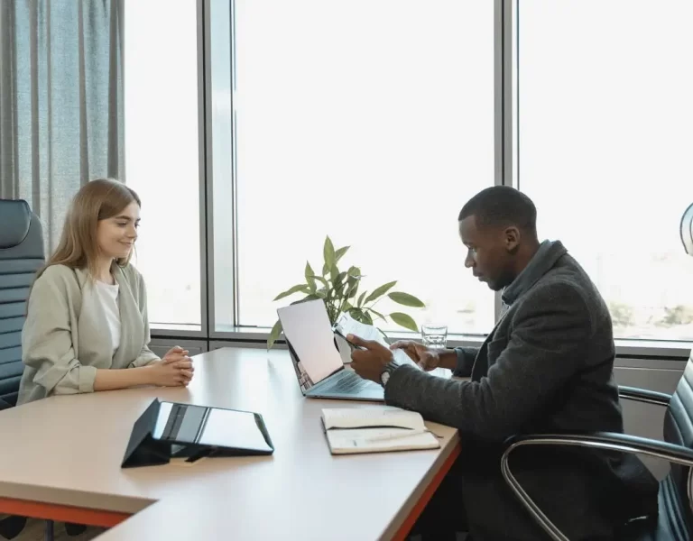 Professional HR compliance concept showing HR completing employment verification for I-9 compliance